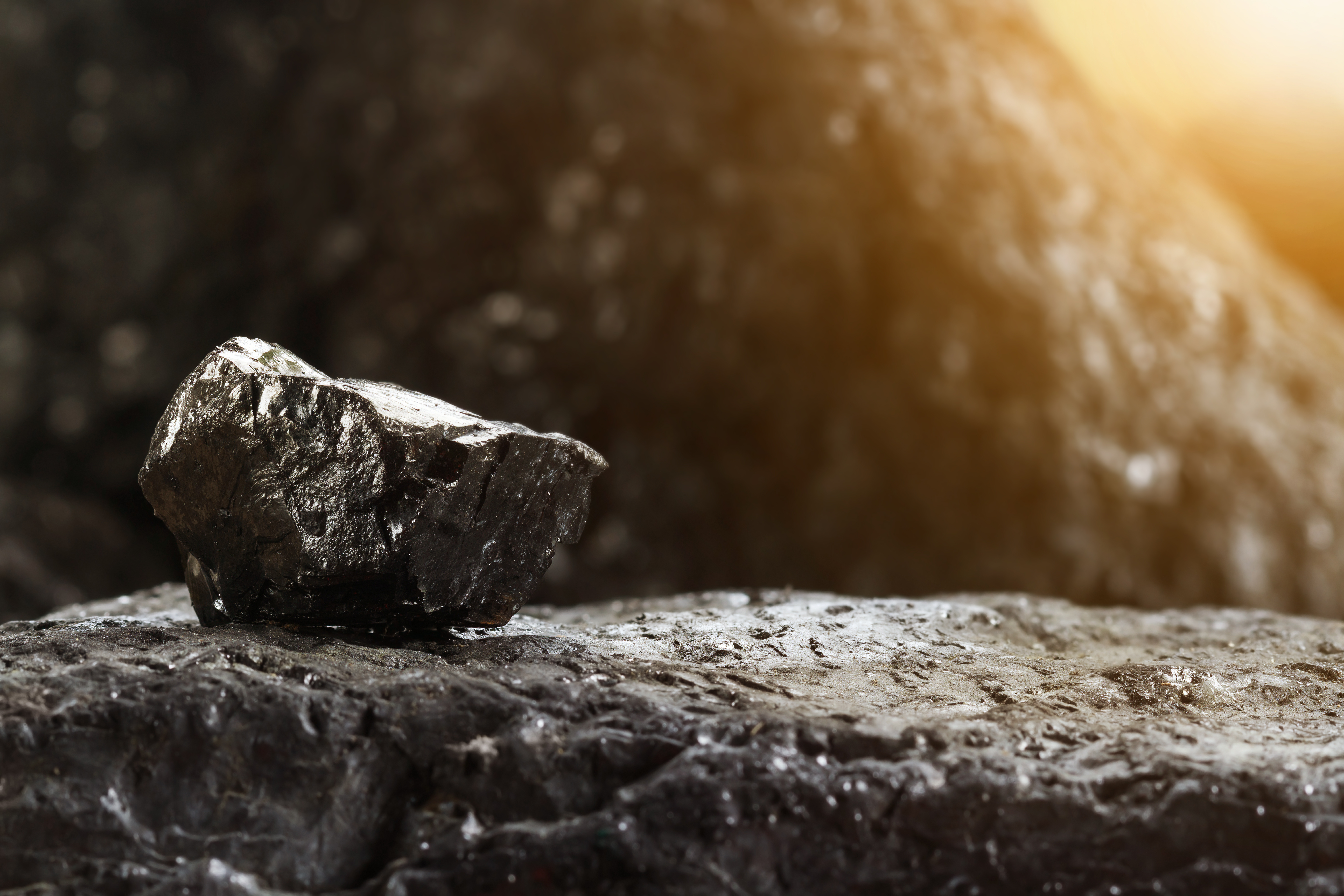 Image of a lump of unprocessed coal, representing how black lung lawyer Mac Heslep at Jenkins Fenstermaker, PLLC can help your company identify exposure to black lung claims and prepare an appropriate response and defense.