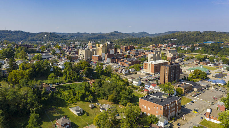 Image of aerial view of Clarksburg, West Virginia, representing how guidance from a WV commercial real estate lawyer Allison J. Farrell on title insurance for commercial property and other aspects of commercial real estate transactions is invaluable.
