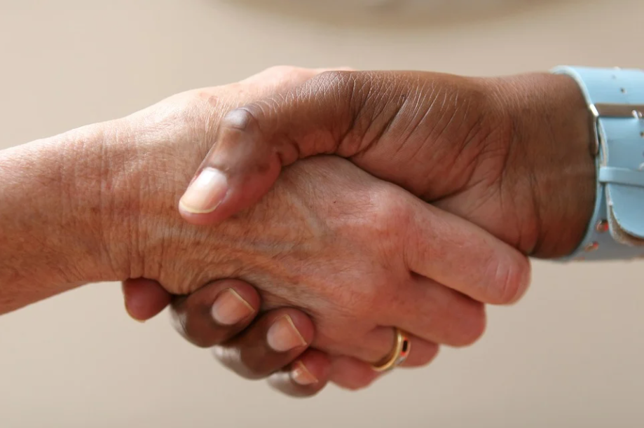 Image of a handshake, representing how business services lawyers at Jenkins Fenstermaker, PLLC can help your company respond to the potential federal ban on non-compete agreements.
