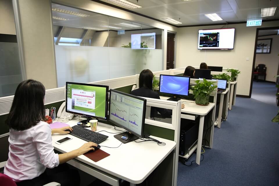 Image of an office with cubicles, representing a location where employee theft can take place.