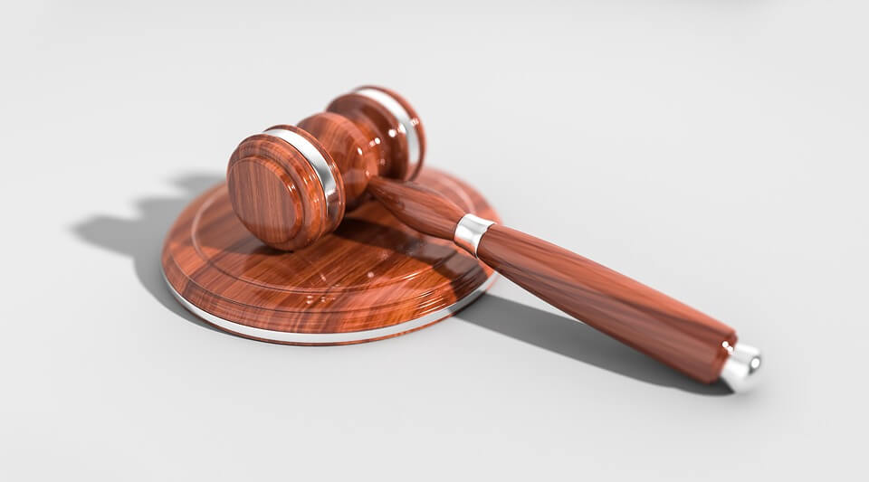 Image of a gavel, symbolizing a federal law passed by Congress in 2019, the Ending Forced Arbitration of Sexual Harassment Act (EFASHA). This law affects sexual harassment and arbitration in the workplace.