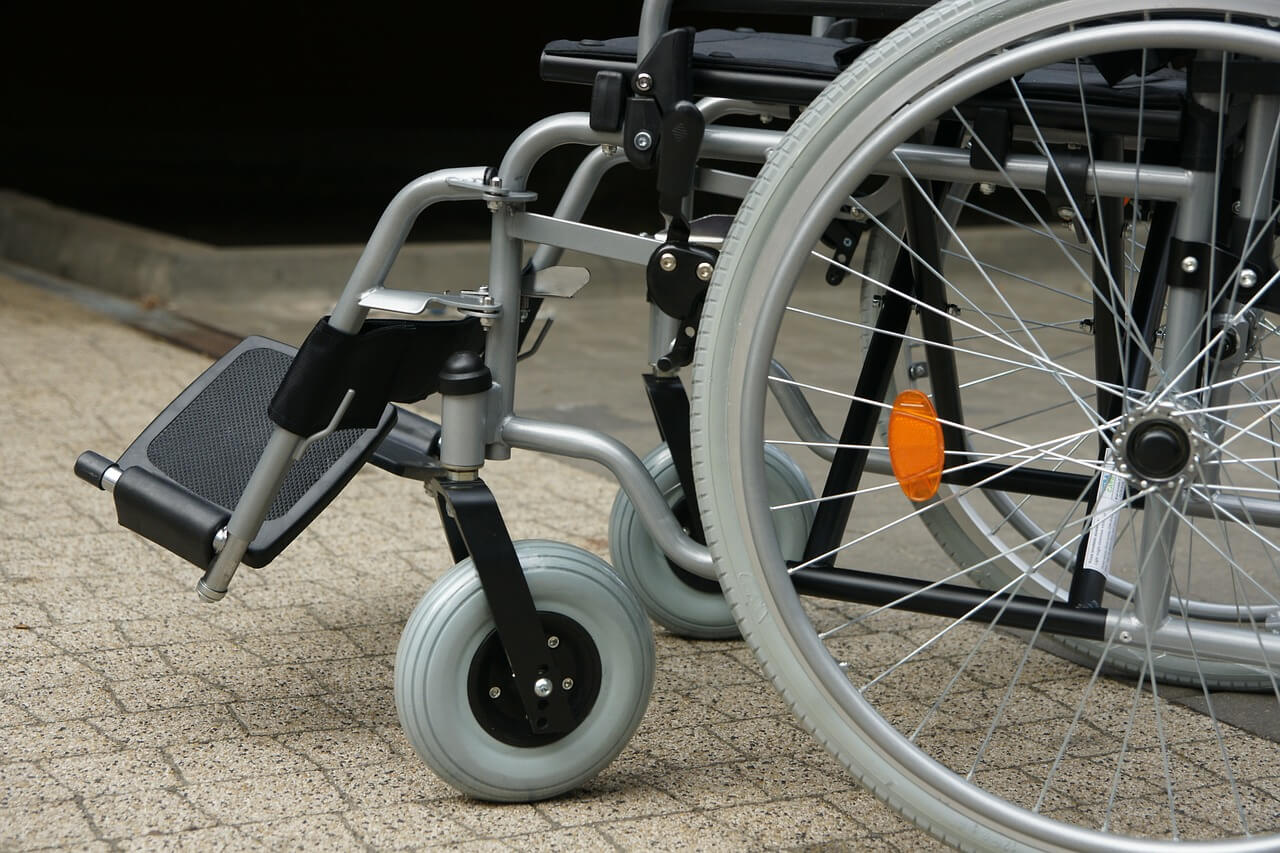 Image of a wheelchair representing an employer defending a workers' compensation claim using the Rule 20 spine impairment tables used to calculate whole body medical impairment ratings in WV.