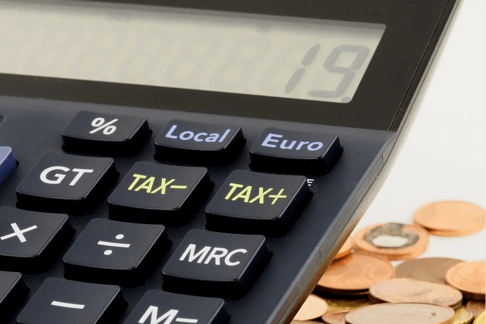 Image of a calculator with tax buttons, representing how estate tax attorney Anna M. Price can help you make the most of the unified tax credit before it’s gone.