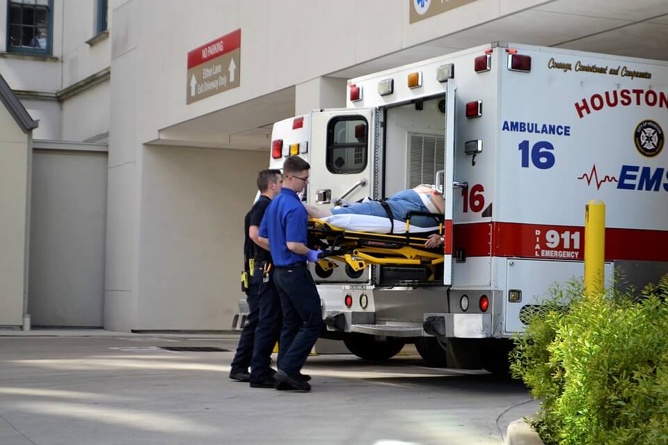 Image of first responders loading a patient into an ambulance, representing how Jenkins Fenstermaker, PLLC provides up-to-date information and full service on workers’ compensation matters.