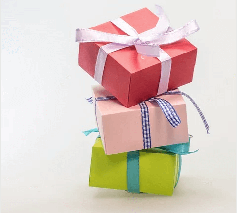Image of three gift boxes, representing the different types of charitable giving and how planned giving attorney Anna Price can help you maximize the benefits of your gifts.