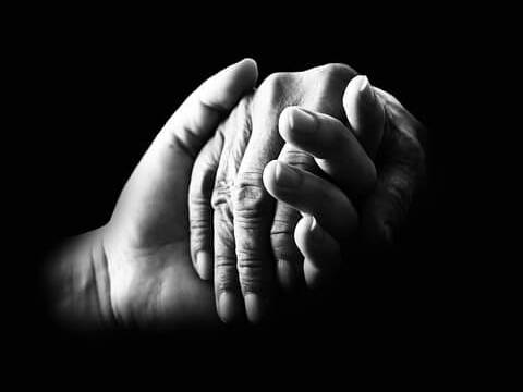 This image depicts two hands holding. Meet with Anna M. Price, an experienced estate planning attorney at Jenkins Fenstermaker, to learn how to serve as a helping hand for future generations by using strategies for charitable giving in WV estate plans.