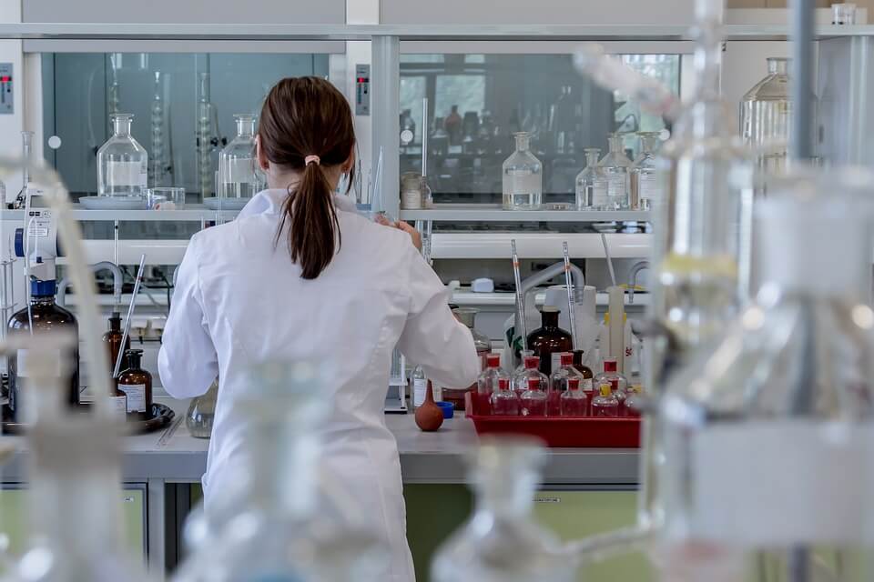 Image of a lab tech working on a speciman, representing the issue of employee drug testing in WV.