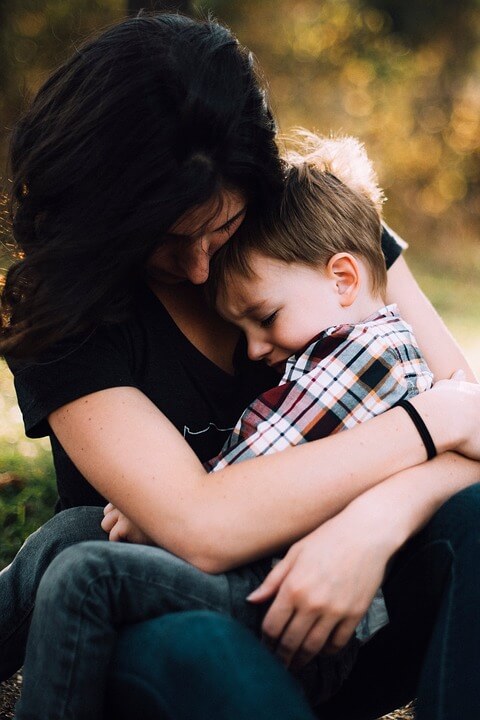 An image of a woman and child looking sad, representing the important considerations of WV estate planning and same-sex couples, who need to take extra steps for the security of their partners and families in the event of incapacitation or death.