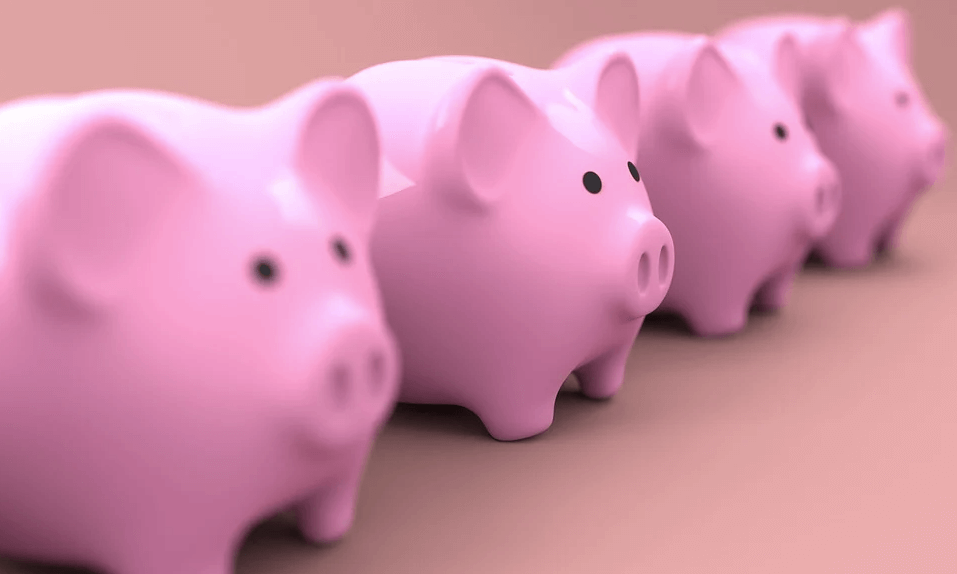 Image of four pink piggy banks, representing the benefits of a charitable pooled income fund for wealth and charitable gift planning as discussed by attorney Anna M. Price in the accompanying blog.