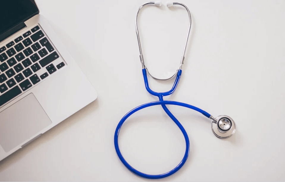 Image of a stethoscope next to a laptop, representing how Anna Price of Jenkins Fenstermaker, PLLC helps you examine the health of your estate wealth and the unified tax credit in WV, KY, and OH.