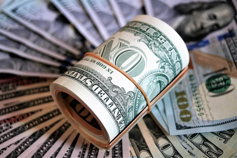 Image of a roll of cash, an example of how you can provide for your family after you’re gone by naming a trust as an IRA beneficiary in West Virginia (WV), Kentucky (KY), or Ohio (OH).