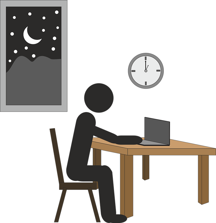 Illustration of a man sitting at a desk working late into the night, showing how a new overtime rule could have affected both employees and employers.